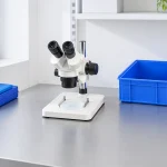 Stereo microscope and connector inspection trays.