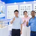 Exhibition visitors at a neutral connector display.