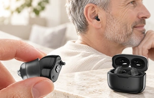 Hearing aids with a four-contact charging case; application concept.