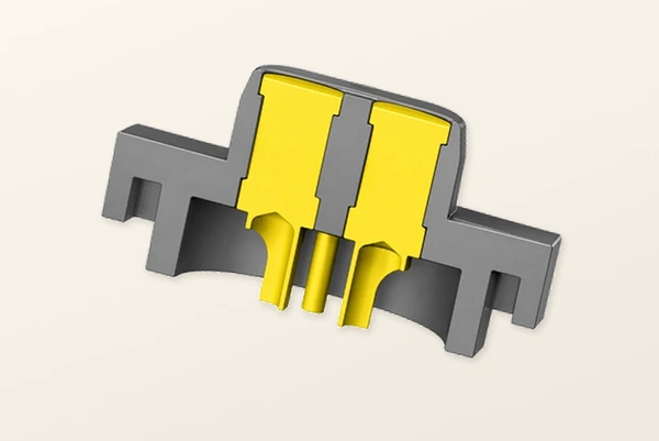 Original two-contact connector housing cutaway in a new pale composition.